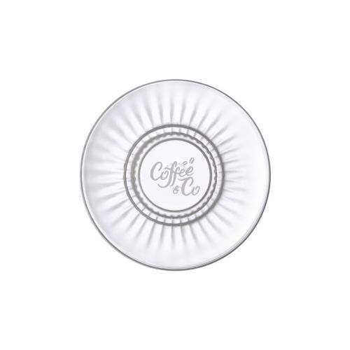 Gravur des CoffeeCo Logos auf der BBarshine Tee/kaffee Teller 14 cm in der Vorderansicht.