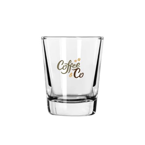 Borrelglas Libbey Shots 6 cl. mit mehrfarbigem CoffeeCo-Logo auf der Vorderseite des transparenten Glases.