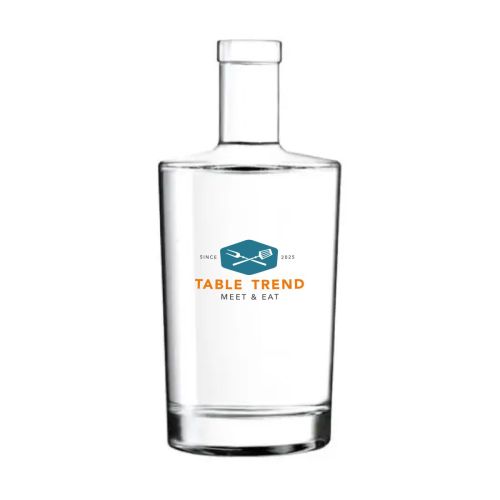 Neos Flasche 0,7 Liter Korken mit mehrfarbigem Logo von TableTrend, zentriert auf der Glasfront.